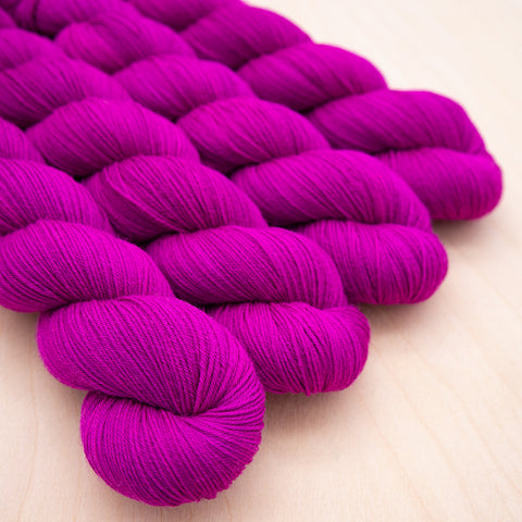 raspberry hand dyed yarn